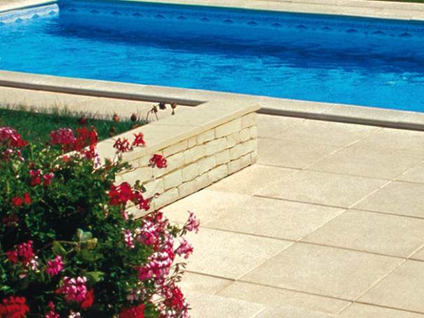 Smooth Fouras pool coping stones in buff colour with matching paving